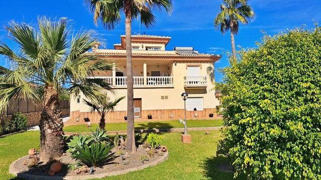 Foto 1 de Chalet en venta en Benajarafe – Almayate de 4 habitaciones con terraza y piscina