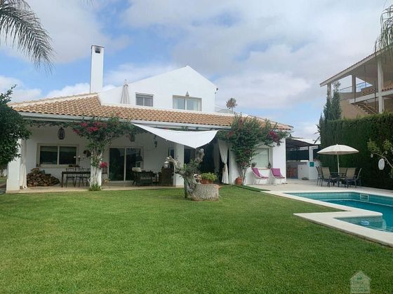 Foto 1 de Casa en venta en El Zaudín - Club de Golf de 5 habitaciones con terraza y piscina