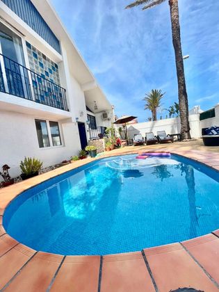 Foto 1 de Casa adossada en venda a avenida La Manga de 4 habitacions amb terrassa i piscina