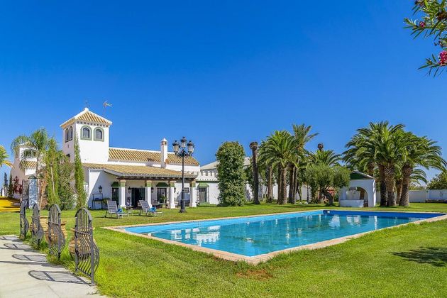 Foto 1 de Casa en venda a Écija de 5 habitacions amb piscina i jardí