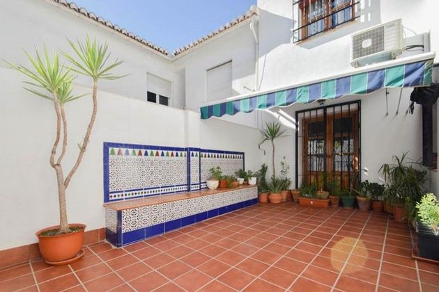Foto 1 de Casa adossada en venda a calle Real de Cartuja de 6 habitacions amb terrassa i garatge