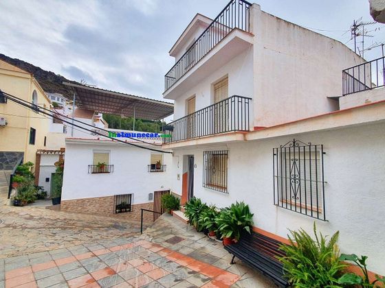 Foto 1 de Casa en venta en Lentegí de 4 habitaciones con terraza y garaje
