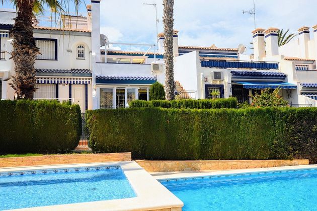 Foto 2 de Casa adossada en venda a Campos de Golf - Villa Martin - Los Dolses de 3 habitacions amb terrassa i piscina