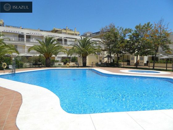 Foto 2 de Casa en venta en Isla Cristina ciudad de 3 habitaciones con terraza y piscina