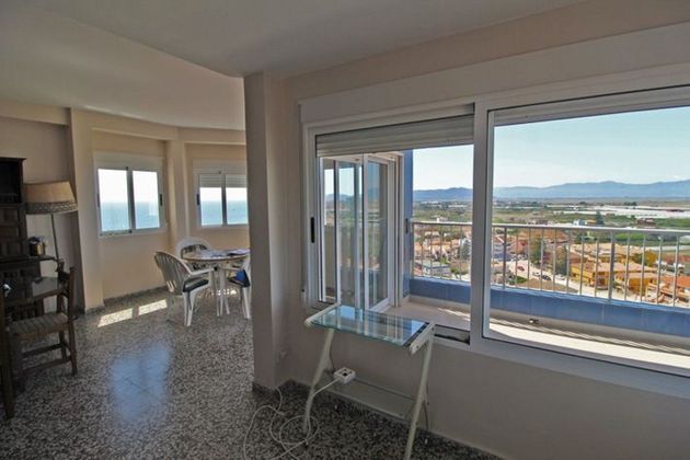 Foto 1 de Venta de piso en El Perelló - Les Palmeres - Mareny de Barraquetes de 4 habitaciones con terraza y piscina