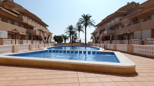 Foto 1 de Venta de casa adosada en calle Playa Blanca de 4 habitaciones con terraza y piscina