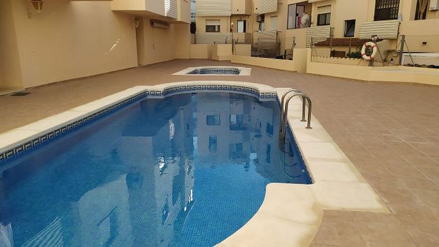 Foto 1 de Piso en venta en L'Eixereta de 4 habitaciones con piscina y balcón