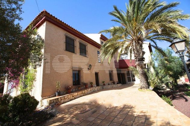Foto 1 de Casa en venta en Puerto de Mazarrón de 6 habitaciones con piscina y garaje