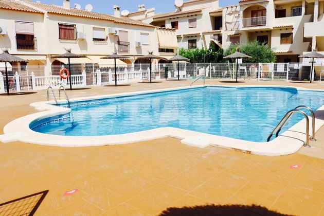 Foto 1 de Dúplex en venta en Puerto de Mazarrón de 2 habitaciones con piscina y aire acondicionado