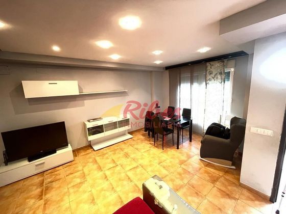 Foto 1 de Casa adossada en venda a avenida D'alzira de 3 habitacions amb terrassa i garatge