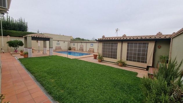 Foto 2 de Chalet en venta en Espartinas de 5 habitaciones con terraza y piscina