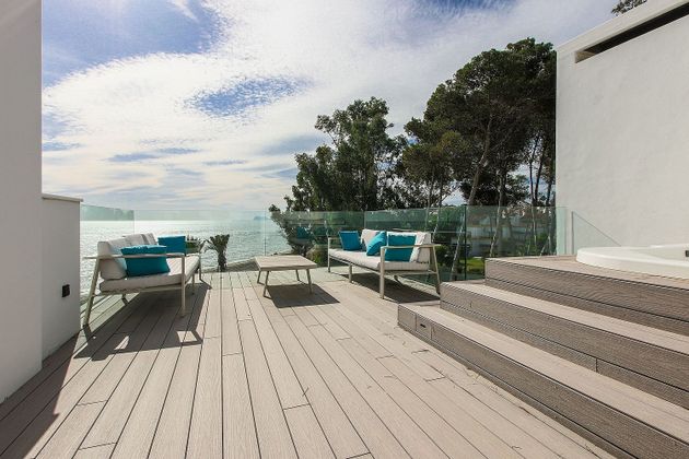 Foto 1 de Venta de casa en urbanización Playa de Guadalobon de 4 habitaciones con terraza y piscina