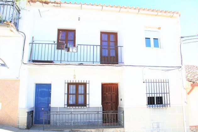 Foto 1 de Venta de casa adosada en calle Murillo de 6 habitaciones con terraza y piscina