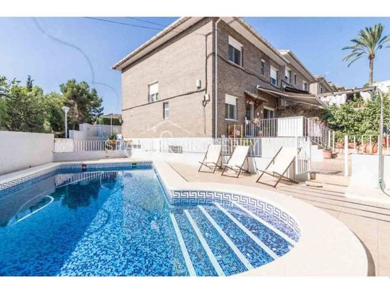 Foto 1 de Casa adossada en venda a Catadau de 5 habitacions amb terrassa i piscina