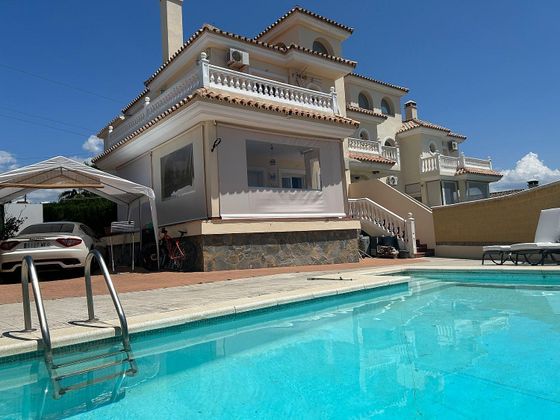 Foto 1 de Venta de casa en El Padrón - El Velerín - Voladilla de 3 habitaciones con terraza y piscina