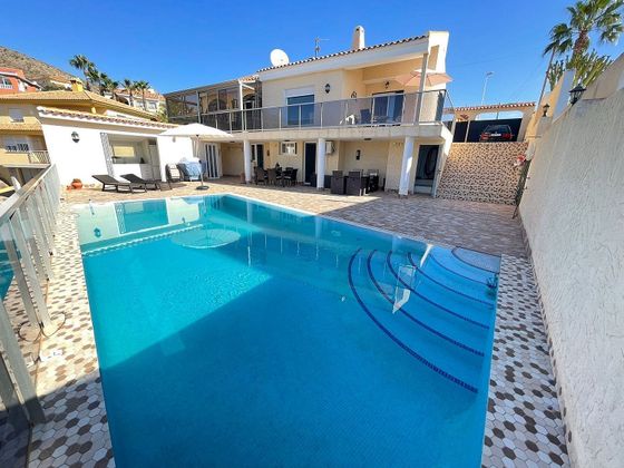 Foto 1 de Chalet en venta en Bolnuevo de 4 habitaciones con terraza y piscina