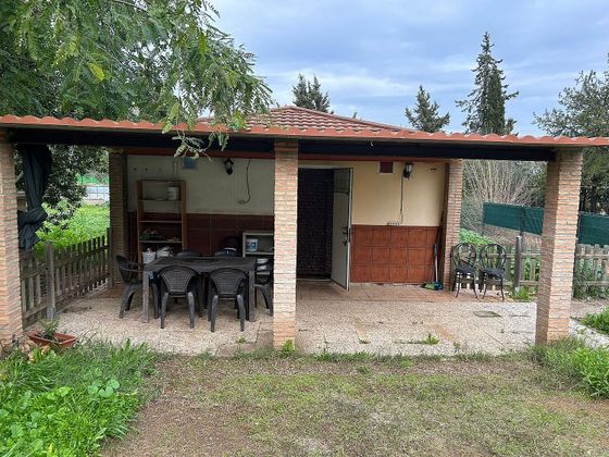 Foto 1 de Venta de chalet en Carmona de 2 habitaciones con piscina y garaje