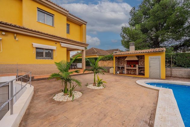 Foto 1 de Casa en venda a Moncada de 5 habitacions amb terrassa i piscina