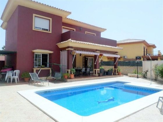 Foto 1 de Venta de chalet en Campo de Mijas de 4 habitaciones con terraza y piscina