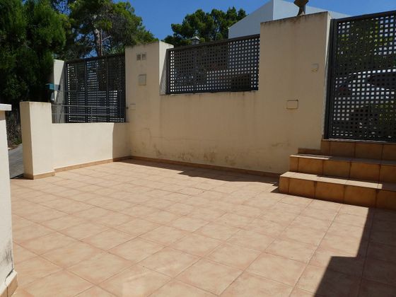 Foto 2 de Casa adosada en venta en Rocafort de 4 habitaciones con terraza y piscina