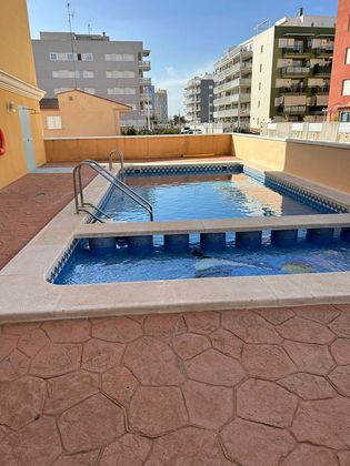 Foto 1 de Dúplex en venta en calle Els Jardins de 3 habitaciones con terraza y piscina