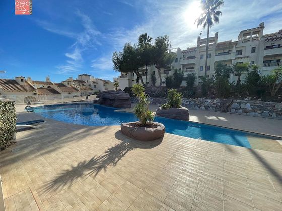 Foto 1 de Ático en venta en Playa Flamenca - Punta Prima de 3 habitaciones con terraza y piscina