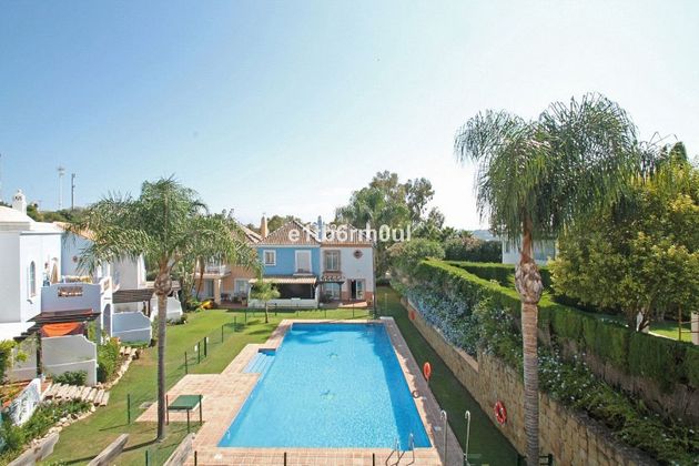 Foto 1 de Casa adossada en venda a urbanización Andalucia L de 3 habitacions amb terrassa i piscina