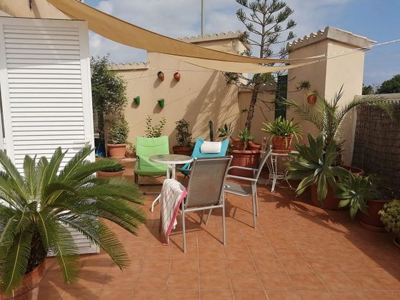 Foto 1 de Casa adosada en venta en Oliva Playa de 3 habitaciones con terraza y piscina