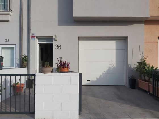 Foto 2 de Casa adossada en venda a Riola de 4 habitacions amb terrassa i garatge
