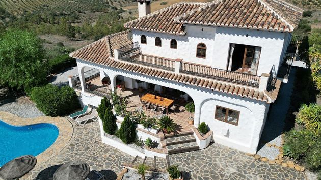 Foto 2 de Venta de casa rural en Viñuela de 4 habitaciones con terraza y piscina