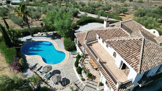 Foto 1 de Casa rural en venda a Viñuela de 4 habitacions amb terrassa i piscina