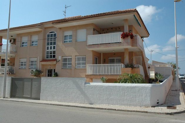 Foto 1 de Casa adossada en venda a Los Nietos de 3 habitacions amb terrassa i garatge