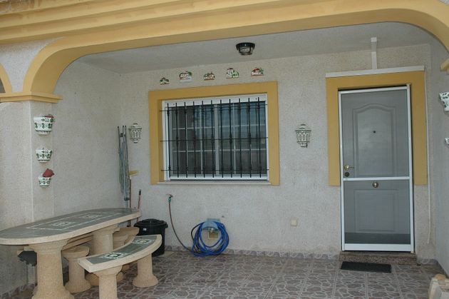 Foto 2 de Casa adossada en venda a calle Himilce de 2 habitacions amb terrassa i aire acondicionat