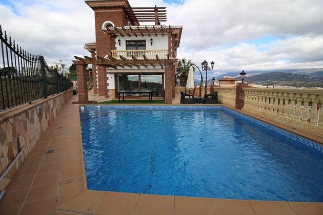 Foto 1 de Chalet en venta en Viña Málaga de 3 habitaciones con terraza y piscina