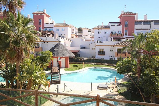 Foto 2 de Venta de ático en Caleta de Vélez de 3 habitaciones con terraza y piscina