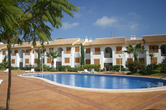 Foto 1 de Venta de casa adosada en carretera Del Puerto de 2 habitaciones con terraza y piscina