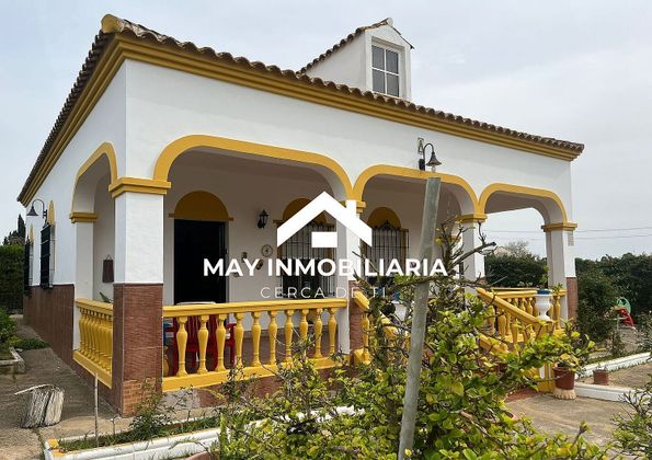 Foto 1 de Casa en venta en Puebla del Río (La) de 2 habitaciones con piscina y jardín