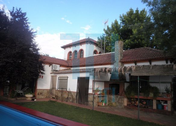 Foto 1 de Venta de casa rural en Llerena de 3 habitaciones con piscina y jardín