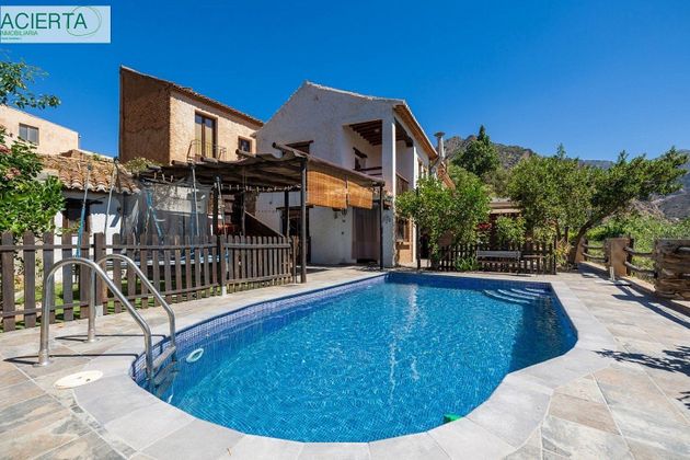Foto 1 de Venta de casa en Nigüelas de 4 habitaciones con terraza y piscina