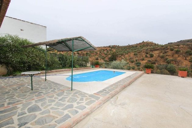 Foto 2 de Chalet en venta en Guaro de 4 habitaciones con terraza y piscina