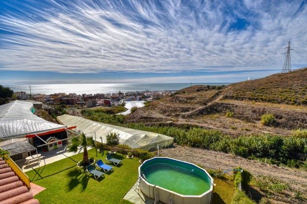 Foto 1 de Venta de casa rural en Caleta de Vélez de 3 habitaciones con terraza y piscina