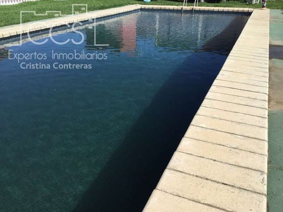 Foto 1 de Venta de casa en Sanlúcar la Mayor de 3 habitaciones con piscina y aire acondicionado
