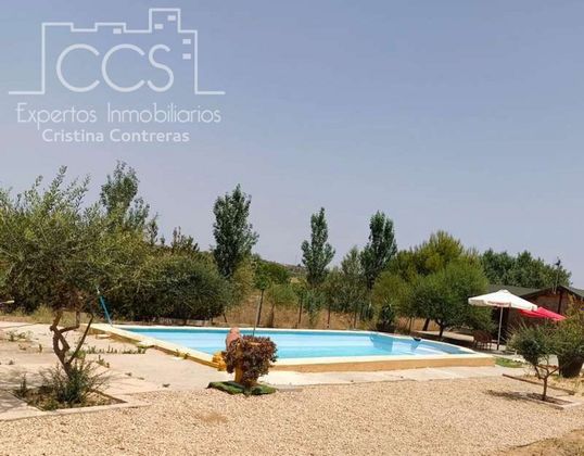 Foto 2 de Casa rural en venda a Rociana del Condado de 3 habitacions amb piscina i jardí