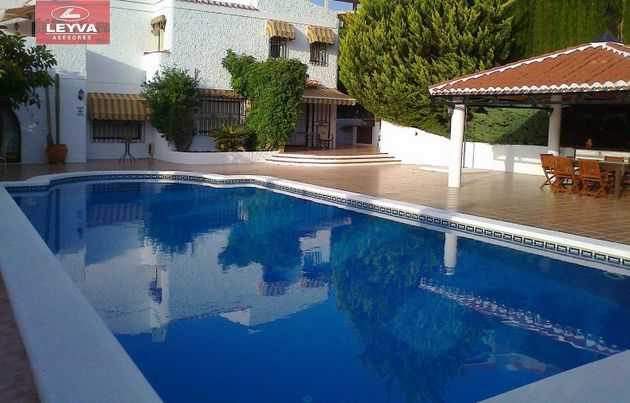 Foto 2 de Chalet en venta en Los Puertos de 4 habitaciones con terraza y piscina