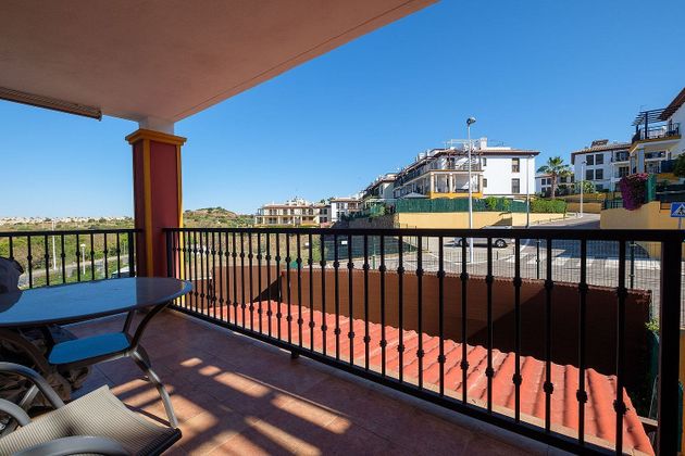 Foto 1 de Piso en venta en Costa Esuri de 2 habitaciones con terraza y piscina