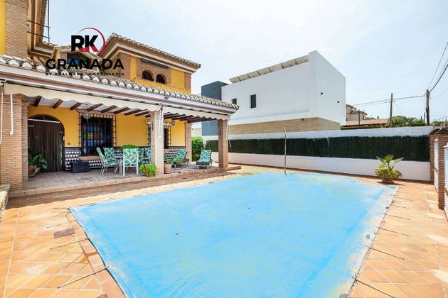 Foto 1 de Alquiler de chalet en Cúllar Vega de 5 habitaciones con terraza y piscina