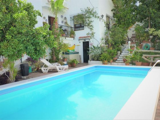 Foto 1 de Venta de chalet en Puerto de la Torre - Atabal de 4 habitaciones con terraza y piscina