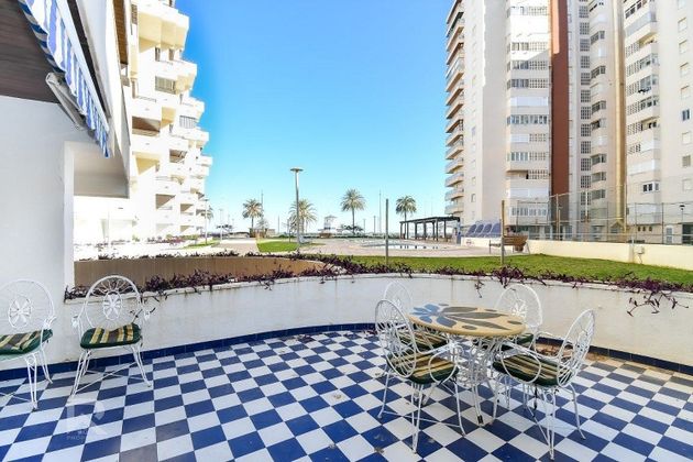 Foto 1 de Pis en venda a Playa de Gandia de 4 habitacions amb terrassa i piscina