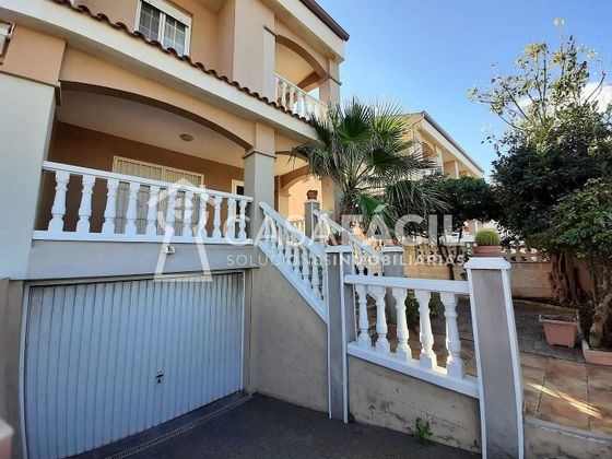 Foto 2 de Venta de casa en El Perelló - Les Palmeres - Mareny de Barraquetes de 4 habitaciones con terraza y piscina