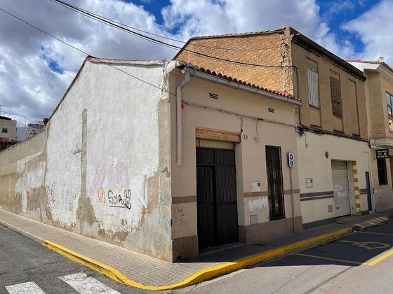 Foto 1 de Venta de casa adosada en calle De Joanot Martorell de 10 habitaciones con terraza